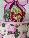 Load image into Gallery viewer, Bow of Cherries Needlepoint Canvas 13 Zweigart Mono Deluxe Mesh Embroidery finished Liberty of London fabric on the edges Sale
