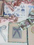 Load image into Gallery viewer, Blue and Pink Bow Needlepoint Canvas 13 Bow Zweigart Mono Deluxe Mesh Embroidery with finished Liberty of London fabric on the edges