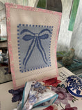 Load image into Gallery viewer, Blue Bow Needlepoint Canvas 13 Bow Zweigart Mono Deluxe Mesh Embroidery with finished Liberty of London fabric on the edges (Copy)
